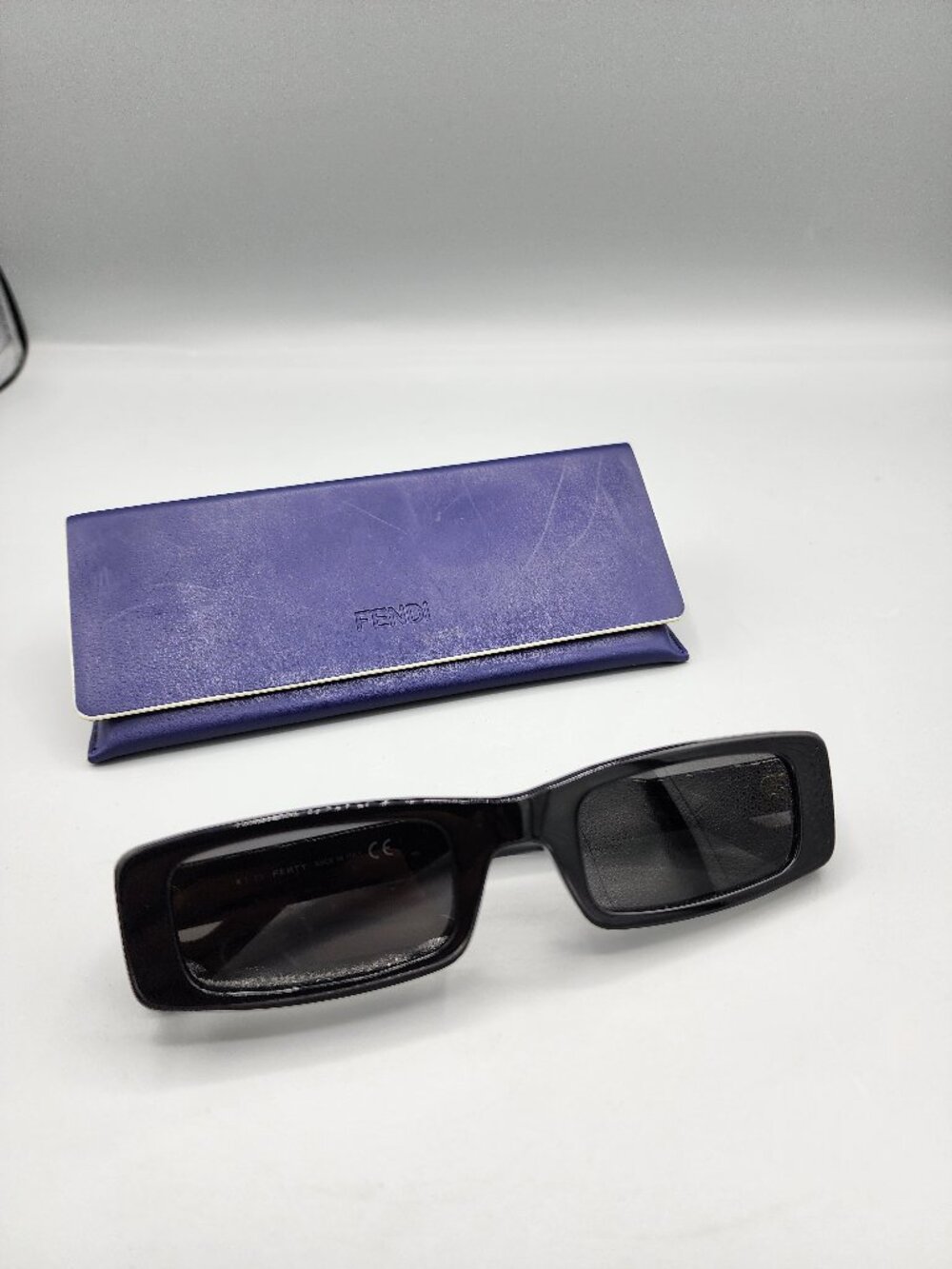 FENTY by Rihanna FV40001U Black Sunglasses & FENDI Purple Leather Case Bundle